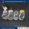 Wholesale China 550ml Cheap Jars/Juice/Honey Glass Bottle with Handle